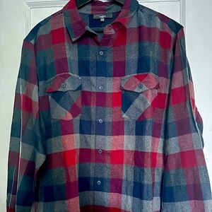 Never worn long sleeved plaid shirt.